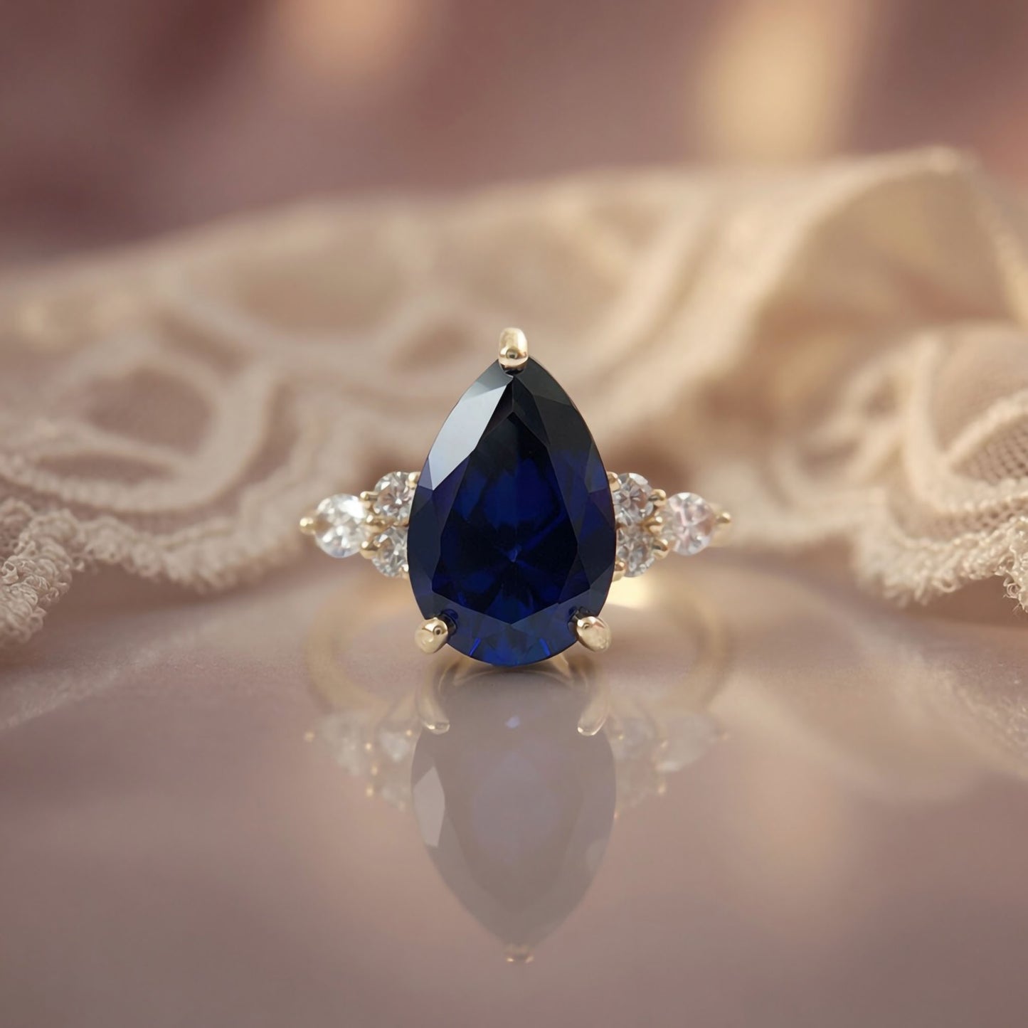 blue-sapphire-pear-engagement-ring