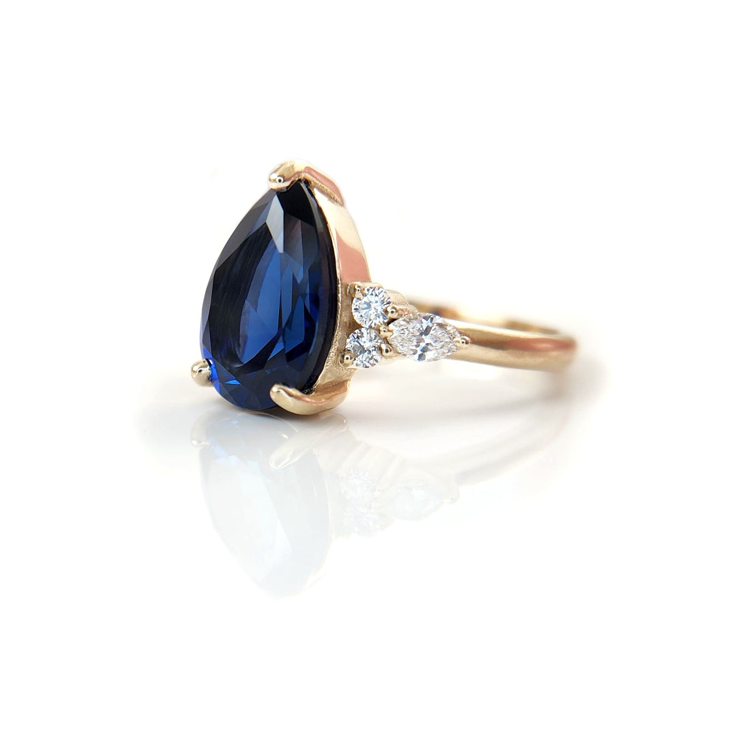blue-sapphire-pear-engagement-ring