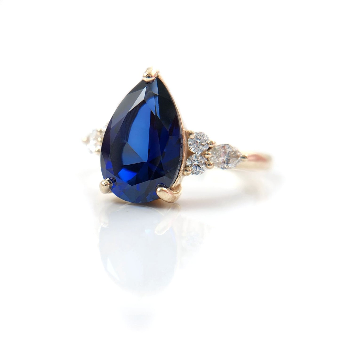 blue-sapphire-pear-engagement-ring