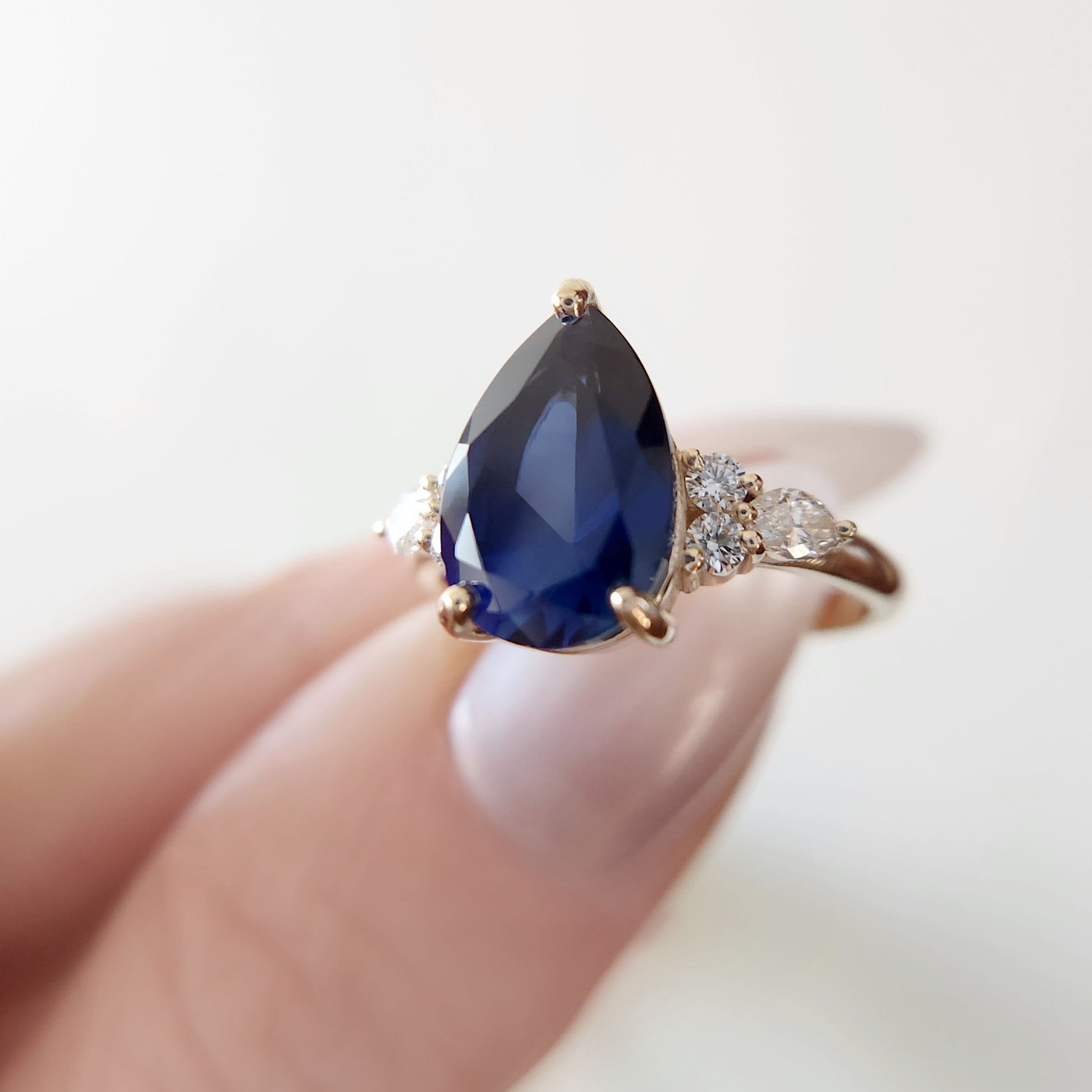 blue-sapphire-pear-engagement-ring